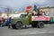 The GAZ-51 car with veterans of the Great Patriotic War takes part in the retro transport parade. Victory Day in St. Petersburg