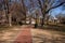 Gazebo and American flag at the Kate Gould Park on a sunny day in winter