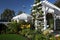 Gazebo and arch in lush garden