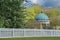 Gazebo behind a fence