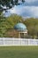 Gazebo behind a fence