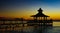 Gazebo bridge sea at sunset