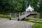 A gazebo built on the water. Covered place for meetings and feasts at a small stake