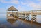 Gazebo, dock, blue sky and clouds