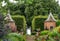 Gazebos at the end of the Red Border at the Arts and Crafts garden at Hidcote Manor in the English Cotswolds, Gloucestershire UK