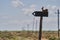 Gazelles signboard in savanna nature park with blue sky and clouds