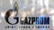Gazprom logo on a glass against blurred crowd on the steet. Editorial 3D rendering