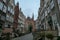 Gdansk - A deserted street in Old Town of Gdansk, Poland. The both sides of a paved alley have tall medieval buildings
