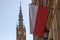 Gdansk, North Poland - August 15, 2020: A polish flag in front of famous St mary church