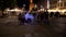 Gdansk, North Poland : Tilt shot of city center main attraction and people walking at night