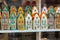 Gdansk, Poland 30.10.2022 - Color ceramic houses, Famous souvenir miniature in a shop window. Vintage housing background