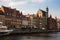 Gdansk Poland. Historical brick colorful building, red roofs and Baltic sea canal, yachts. Sunny day, spring time.