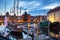 Gdansk, Poland - July 8, 2019: Beautiful scenery of Gdansk over Motlawa river at dusk, Poland. Gdansk is the historical capital of