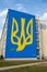 Gdansk Poland March 2022 UKRAINE national emblem with pigeon symbol of peace IN GRAFFITI. Mural painted in building