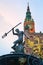 Gdansk, Poland. Statue of Neptune in a fountain, symbol of the city. Town Hall on background.