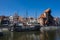 Gdansk, Poland. view of the city and the river MotÅ‚awa with a pirate ship and buildings on the embankment