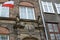 Gdansk. The Polish flag flutters on a facade of the old building