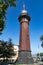 Gdansk, Pomeranian / Poland - September, 24, 2019: Old lighthouse in Gdansk. Harbor buildings in Central Europe