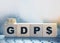 GDP For Gross Domestic Product Word on Wooden Cubes