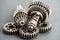 Gear and cogs wheels, clock mechanism, brass metal engine industrial