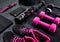 Geared up and ready to go get fit. High angle shot of a group of workout essentials lying on top of a dark background