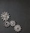 Gears and cogs on steam punk metal background 3d illustration