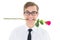 Geeky hipster holding a red rose in his teeth