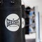 Geezers brand black and white punchbags hanging in a boxing gym