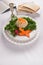 Gefilte Fish with Kidduch Cup, Matzah and Haggadah