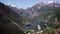 Geiranger fjord area, Norway. Aerial view at summer time. Fairytale landscape with its majestic, snow-covered mountain