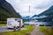 Geiranger fjord, Norway. Family vacation travel RV, holiday trip in motorhome, Caravan car Vacation