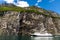 Geiranger, Geirangerfjord, Norway - June , 2019: Touristic ship berry boat floating liner near Geiranger in Geirangerfjorden in