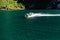 Geiranger, Geirangerfjord, Norway - June , 2019: Touristic ship berry boat floating liner near Geiranger in Geirangerfjorden in