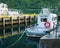 GEIRANGER, NORWAY - 15 JUN 2019: Serene scene of boat at dock on the fjord