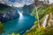 Geirangerfjord and Seven Sisters Waterfalls at sunset, Norway, Northern Europe