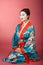 Geisha Japanese woman in kimono and facepaint