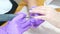 Gel polish removal process. Nail treatment apparatus, hardware manicure