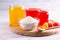 Gelling agents: gelatin, agar-agar or pectin powder with marmalade on wooden cutting board