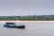Gemadept river container boat sailing on Long Tau River, Phuoc Khanh, Vietnam