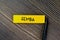 Gemba write on sticky notes isolated on Wooden Table