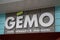 gemo logo text shop clothing sign store entrance street french brand company facade