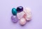 Gemstone minerals on a pink background. Amethyst, rose quartz and apatite