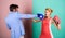 Gender battle. Gender equal rights. Family quarrel. Strong punch. Boxers fighting in gloves. Gender equality. Man and