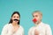 Gender concept. Female and male sex icon. Funny couple of woman with moustache and man with red lips. Transgender gender