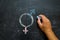 Gender symbols or signs for the male and female sex drawn on a blackboard