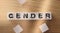 Gender Word Written on Wooden Cubes. Gender quality and social issues problems concept