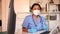 General practitioner woman wearing medical mask talking in clinic office