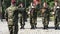 General saluting soldiers at a parade