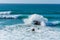 General shot of waves on rocks on the beach of Liencres, in Cantabria, Spain,