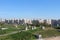 General view of Astana City with many residential buildings and cranes.